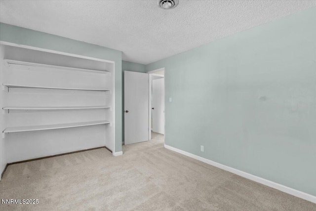 2731 Wabash Cir, Sparks, NV 89434 - unfurnished bedroom with carpet floors, baseboards, a textured ceiling, and a closet