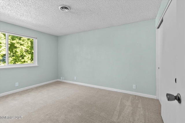 2731 Wabash Cir, Sparks, NV 89434 - unfurnished bedroom with a textured ceiling, a closet, carpet flooring, and baseboards