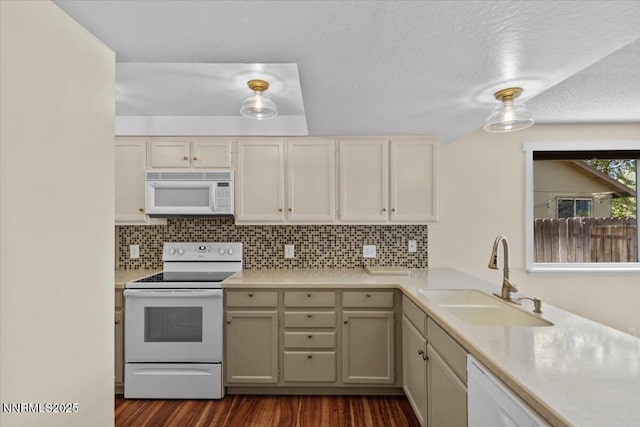 2731 Wabash Cir, Sparks, NV 89434 - kitchen with white appliances, a sink, light countertops, dark wood-type flooring, and a textured ceiling