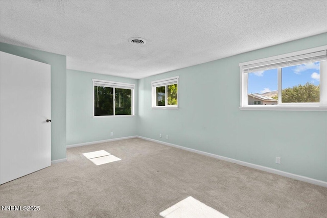 2731 Wabash Cir, Sparks, NV 89434 - empty room featuring carpet floors, a textured ceiling, and baseboards