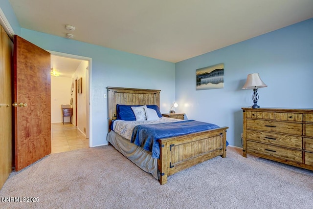710 Tina Ct # B-2, Stateline, NV 89449 - carpeted bedroom with tile patterned floors and baseboards