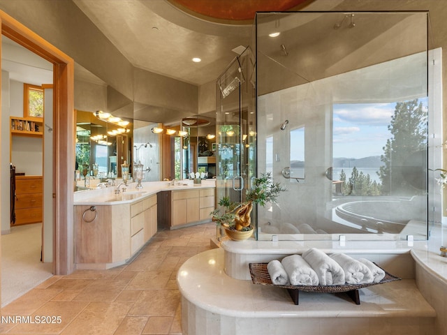 563 Knotty Pine Dr, Incline Village, NV 89451 - bathroom featuring vanity, a shower stall, stone tile flooring, a chandelier, and a bath