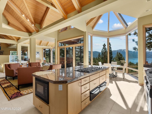 563 Knotty Pine Dr, Incline Village, NV 89451 - sunroom / solarium featuring wood ceiling, a mountain view, tile patterned floors, and plenty of natural light