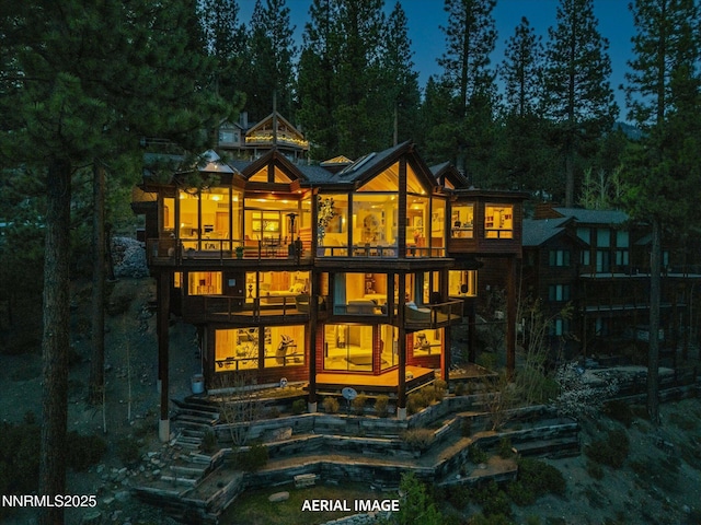 563 Knotty Pine Dr, Incline Village, NV 89451 - back of property with a balcony and stairway