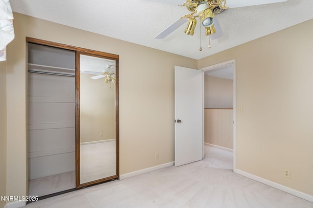 3164 Clan Alpine Dr, Sparks, NV 89434 - unfurnished bedroom with carpet flooring, a closet, a ceiling fan, and baseboards