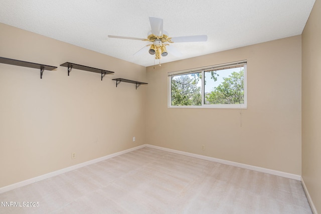 3164 Clan Alpine Dr, Sparks, NV 89434 - spare room featuring ceiling fan, light colored carpet, and baseboards