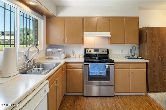 110 Smithridge Park, Reno, NV 89502 - kitchen featuring stainless steel range with electric stovetop, a sink, exhaust hood, dishwasher, and light countertops