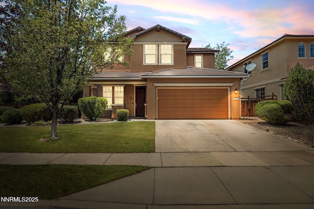 7121 Jermann Dr, Sparks, NV 89436 - view of front of property with stucco siding, driveway, a garage, and a tile roof