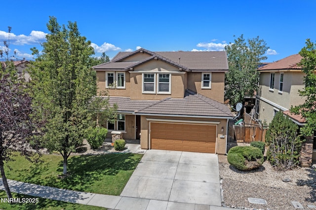 7121 Jermann Dr, Sparks, NV 89436 - traditional-style home featuring concrete driveway, stucco siding, a tile roof, and a garage