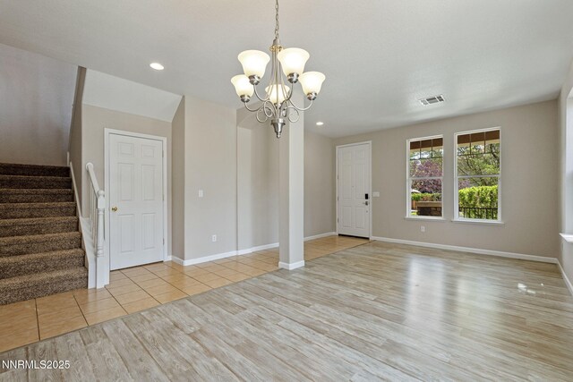 7121 Jermann Dr, Sparks, NV 89436 - unfurnished room featuring wood finished floors, a chandelier, stairway, and recessed lighting
