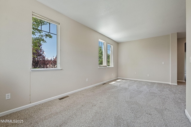 7121 Jermann Dr, Sparks, NV 89436 - carpeted empty room featuring plenty of natural light