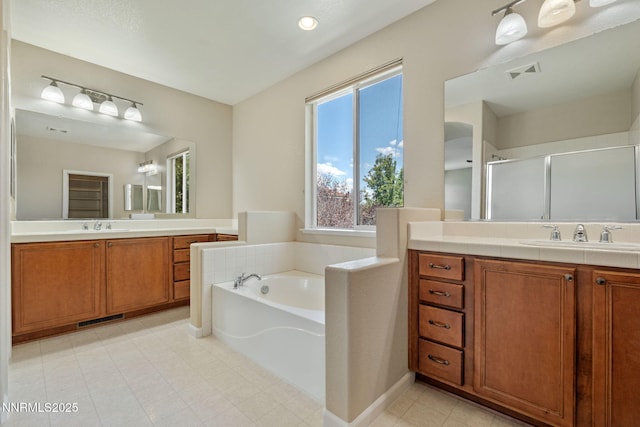 7121 Jermann Dr, Sparks, NV 89436 - bathroom featuring a shower stall, vanity, and a bath