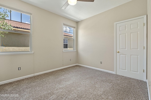 7121 Jermann Dr, Sparks, NV 89436 - carpeted spare room with a ceiling fan and baseboards