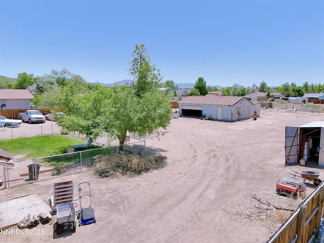 1331 Stephanie Way, Minden, NV 89423 - view of yard with a detached garage and a mountain view