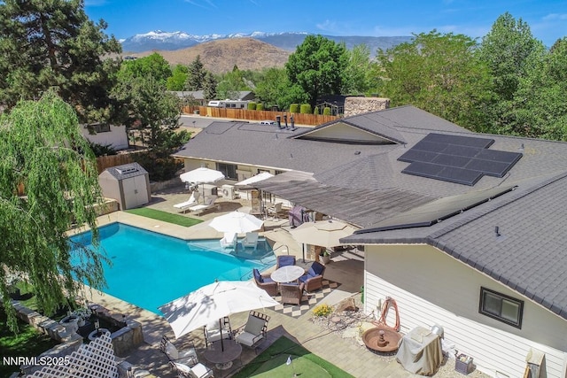 5000 Saint Andrews Dr, Reno, NV 89502 - view of subject property featuring a mountain backdrop and a pool area