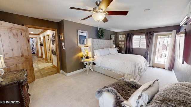 5000 Saint Andrews Dr, Reno, NV 89502 - carpeted bedroom featuring baseboards, access to exterior, and a ceiling fan