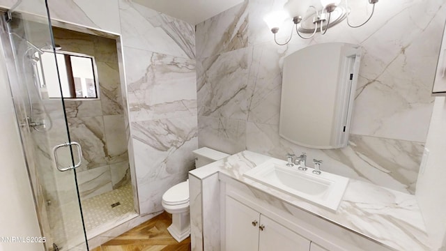5000 Saint Andrews Dr, Reno, NV 89502 - bathroom featuring toilet, tile walls, vanity, and a marble finish shower