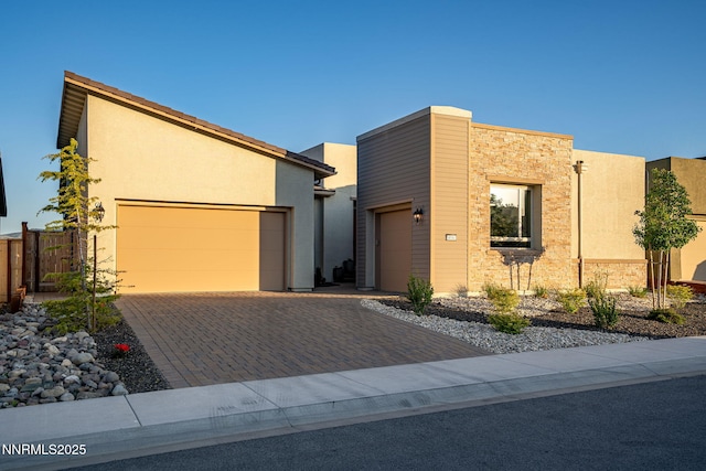 9192 Graycliff Ln, Reno, NV 89523 - view of front of property with a garage, driveway, and stucco siding