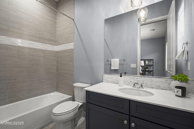 9192 Graycliff Ln, Reno, NV 89523 - bathroom with vanity, shower / tub combination, toilet, and a textured wall