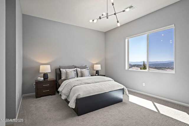 9192 Graycliff Ln, Reno, NV 89523 - carpeted bedroom featuring a chandelier and baseboards