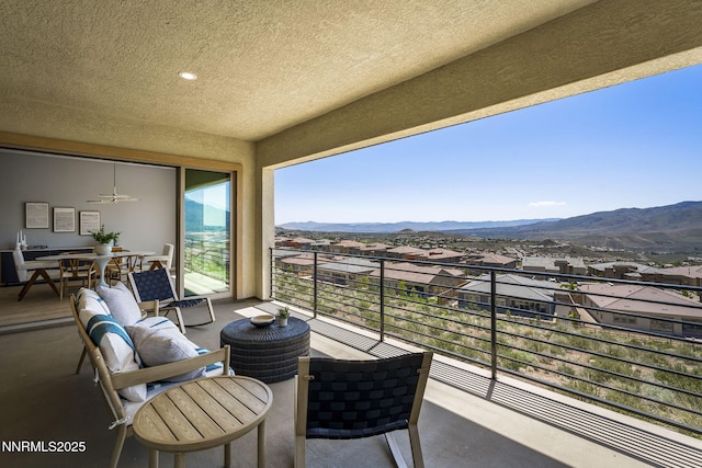 9192 Graycliff Ln, Reno, NV 89523 - balcony with a mountain view, a residential view, and outdoor dining space
