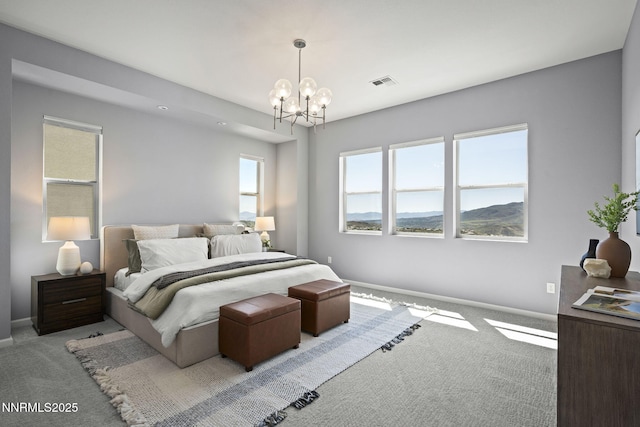 9192 Graycliff Ln, Reno, NV 89523 - carpeted bedroom with a chandelier and baseboards