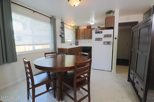 3191 Crescent Ct, Sparks, NV 89431 - dining room featuring light floors and baseboards