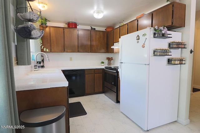 3191 Crescent Ct, Sparks, NV 89431 - kitchen with freestanding refrigerator, dishwasher, electric range, a sink, and light flooring