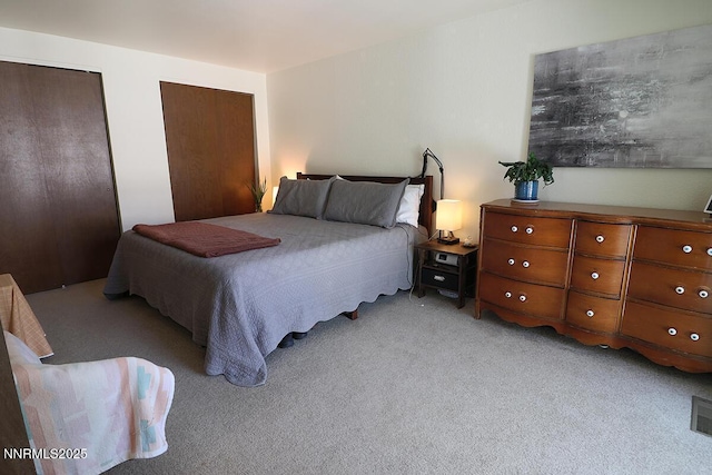 3191 Crescent Ct, Sparks, NV 89431 - bedroom featuring two closets and carpet
