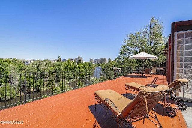 745 California Ave, Reno, NV 89509 - wooden deck with outdoor dining space