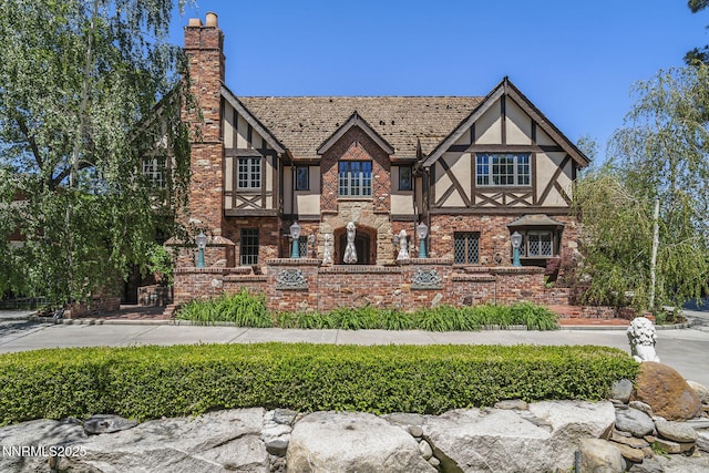 745 California Ave, Reno, NV 89509 - english style home with stucco siding and a chimney