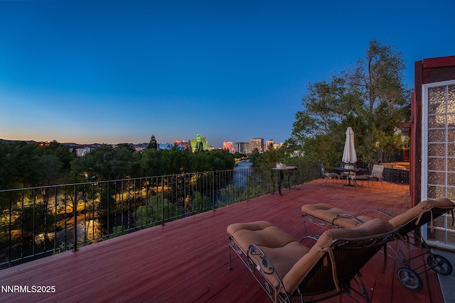 745 California Ave, Reno, NV 89509 - deck at dusk with outdoor dining space