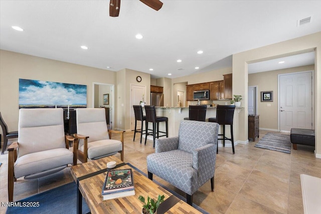 1605 W Del Webb Pkwy, Reno, NV 89523 - living room with recessed lighting, a ceiling fan, and baseboards