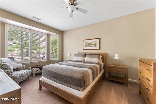 1605 W Del Webb Pkwy, Reno, NV 89523 - carpeted bedroom with a ceiling fan and baseboards