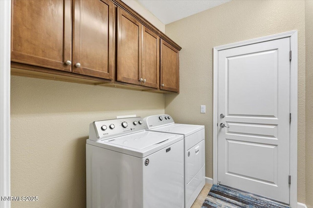 1605 W Del Webb Pkwy, Reno, NV 89523 - laundry area featuring washer and dryer, cabinet space, and a textured wall