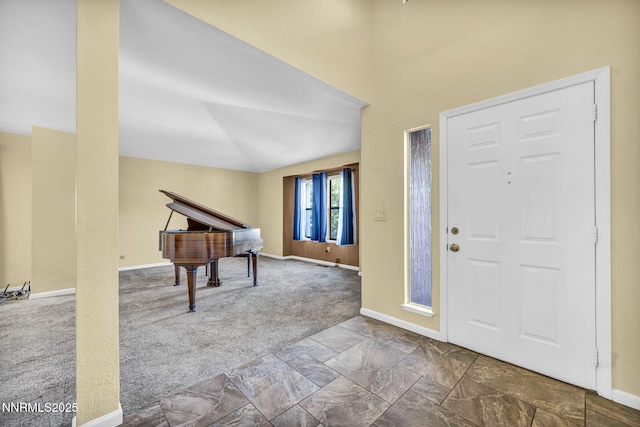 285 Lemming Dr, Reno, NV 89523 - carpeted foyer entrance with baseboards and stone finish flooring
