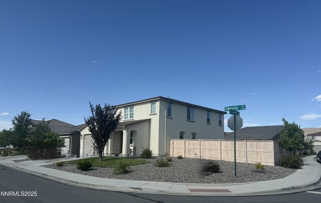 9754 Belville Dr, Reno, NV 89521 - view of property featuring a garage