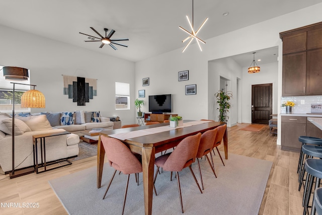 611 Camargue Trl, Reno, NV 89511 - dining area with light wood finished floors and baseboards