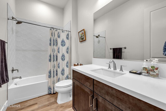611 Camargue Trl, Reno, NV 89511 - bathroom featuring wood finished floors, shower / bathtub combination with curtain, vanity, and toilet