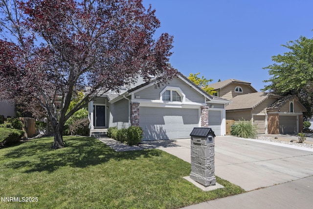 6055 Stonecreek Dr, Reno, NV 89511 - view of property hidden behind natural elements with concrete driveway, a front yard, and a garage