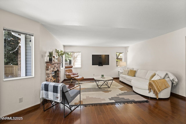 6055 Stonecreek Dr, Reno, NV 89511 - living room featuring wood-type flooring, healthy amount of natural light, and a brick fireplace