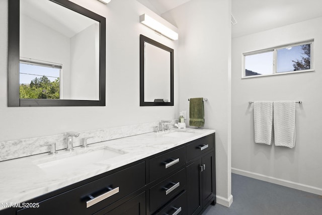 6055 Stonecreek Dr, Reno, NV 89511 - full bathroom with double vanity and healthy amount of natural light