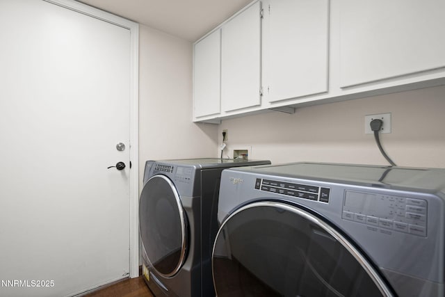 6055 Stonecreek Dr, Reno, NV 89511 - laundry area with washer and dryer, cabinet space, and dark wood-type flooring