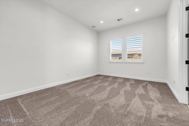 9740 Cardigan Bay Ln, Reno, NV 89521 - carpeted empty room featuring baseboards and recessed lighting