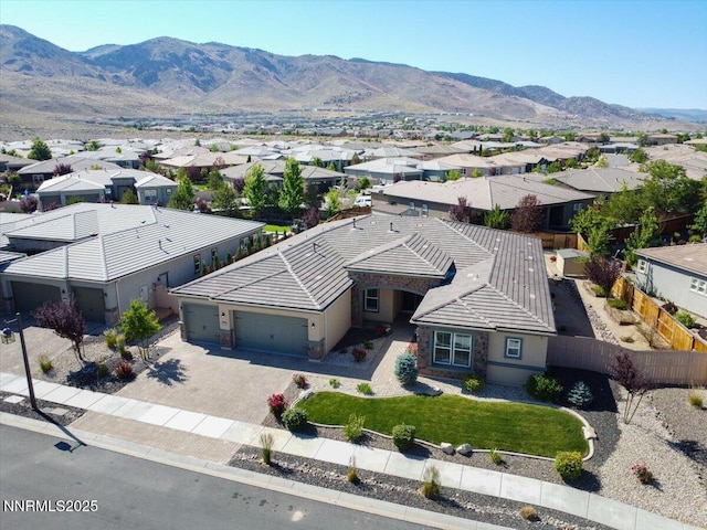 9740 Cardigan Bay Ln, Reno, NV 89521 - aerial view of residential area with a mountainous background