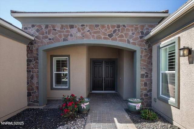 9740 Cardigan Bay Ln, Reno, NV 89521 - entrance to property with stone siding and stucco siding