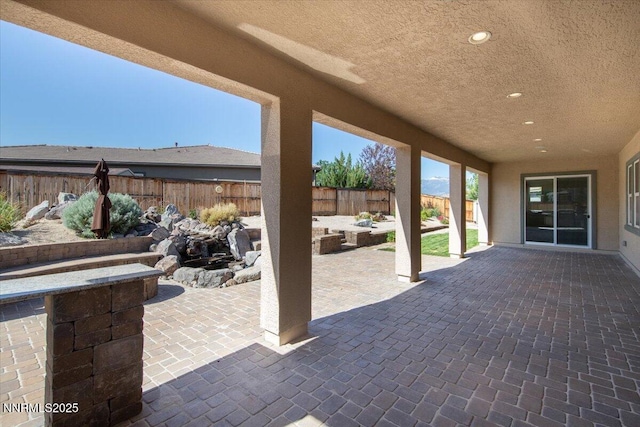 9740 Cardigan Bay Ln, Reno, NV 89521 - fenced backyard with a patio