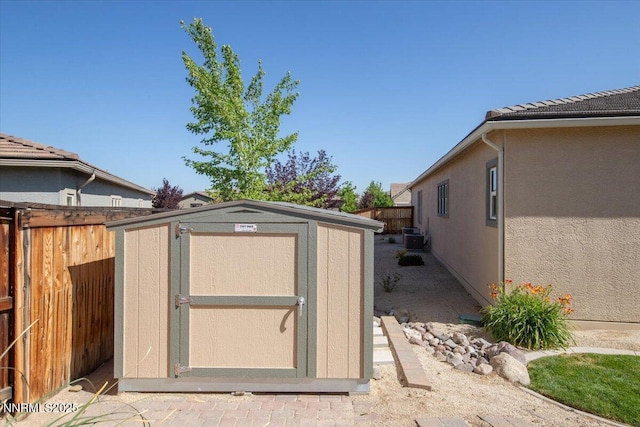 9740 Cardigan Bay Ln, Reno, NV 89521 - view of shed featuring a fenced backyard