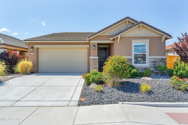 6177 Cotton Rosser Rd, Sparks, NV 89436 - craftsman-style home featuring stone siding, a garage, stucco siding, and concrete driveway