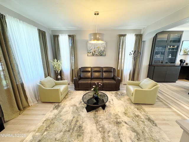 6726 Runnymede Dr, Sparks, NV 89436 - living area featuring healthy amount of natural light and wood finished floors